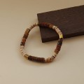 Bransoletka z kamieni krążki jaspis brązowy hematyt złoty kokos jasny